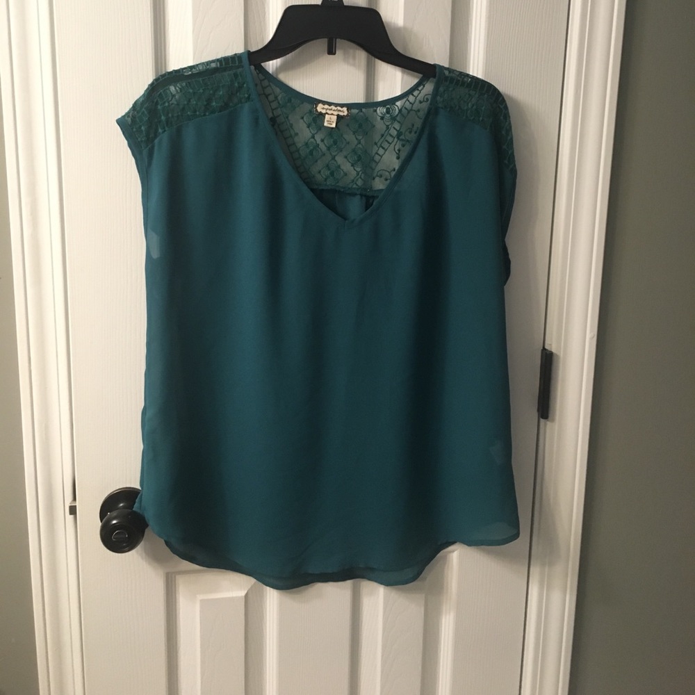 Jade green top.