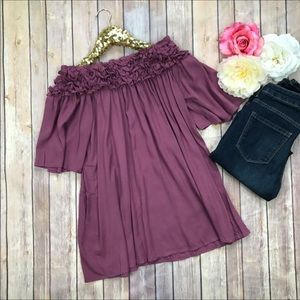 Purple off-shoulder ruffle blouse