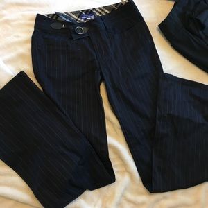 Burberry navy pin striped dress pants.