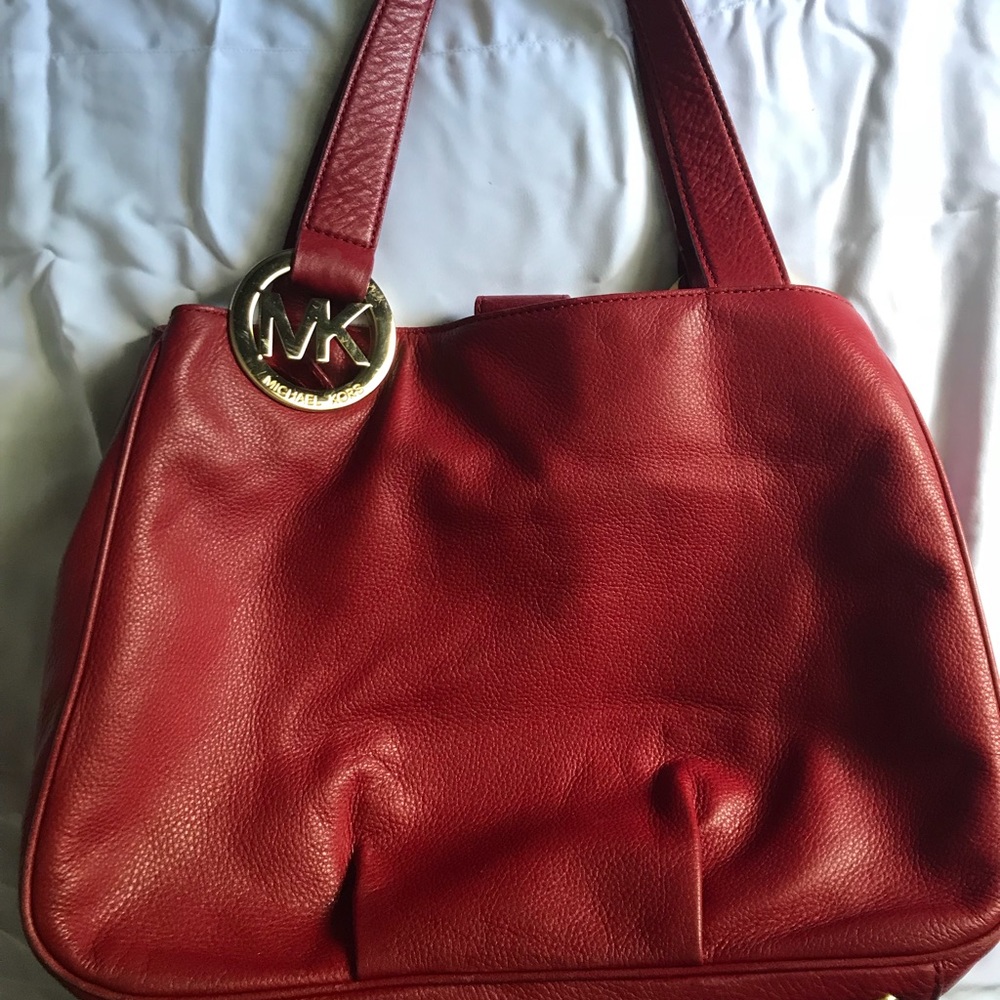 Authentic Michael Kors purse in Red