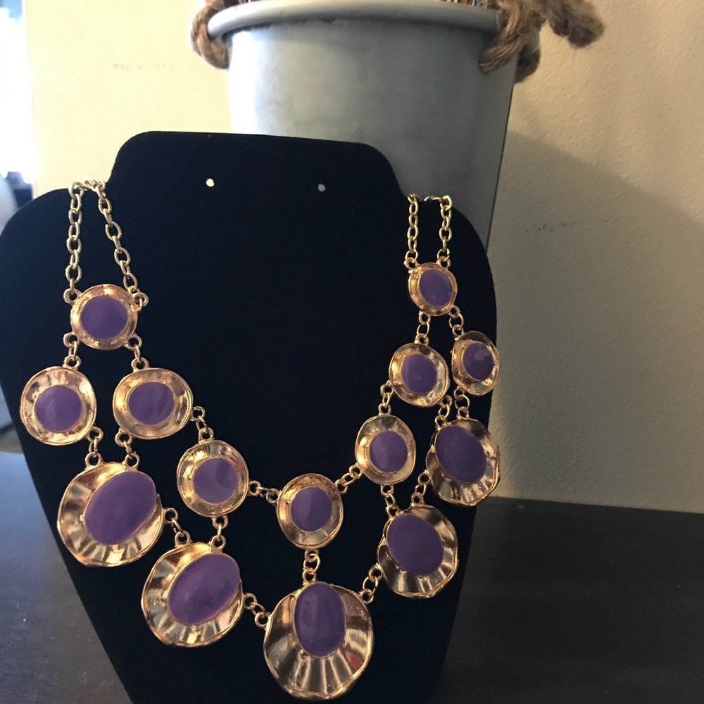 Very nice purple and gold layered necklace.