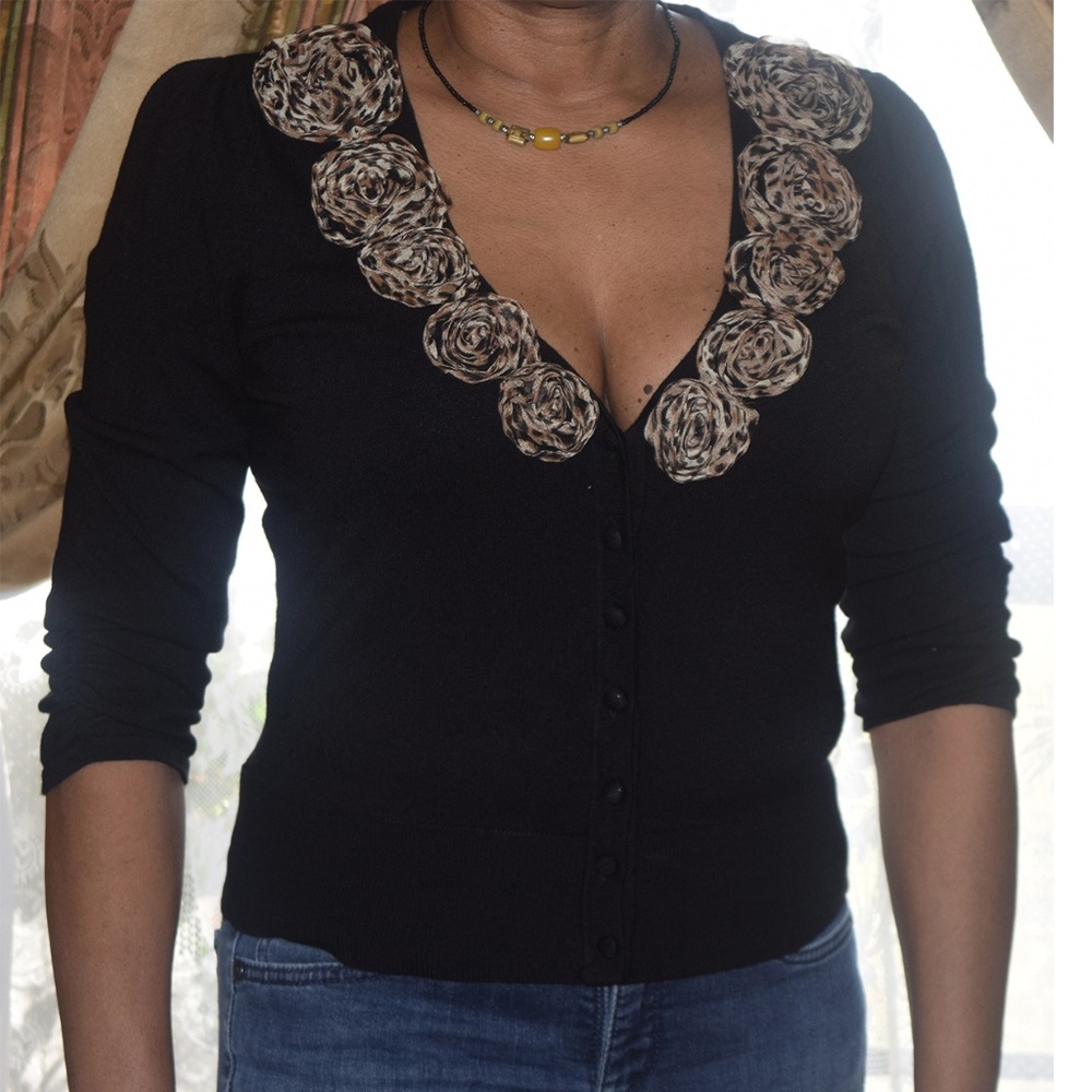 Cropped buttoned down sweater