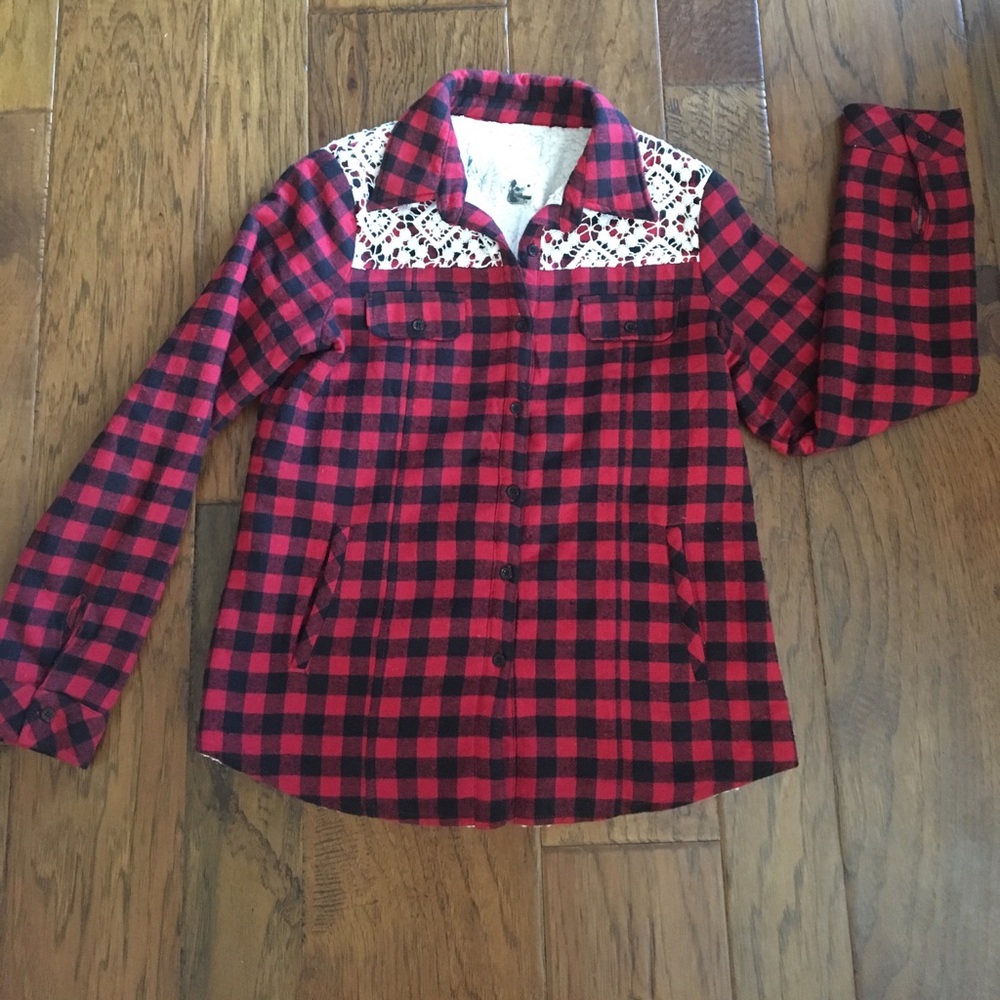 Plaid button shirt with fuzzy white insulation.