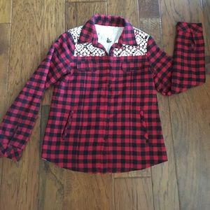 Plaid button shirt with fuzzy white insulation.