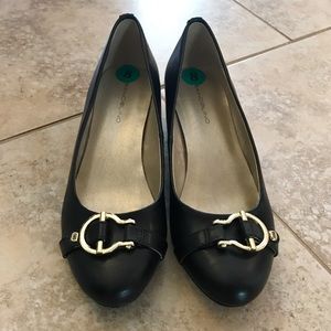 Black heels with gold buckle