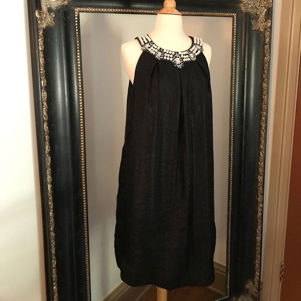 Elegant little black dress by R &M Richards