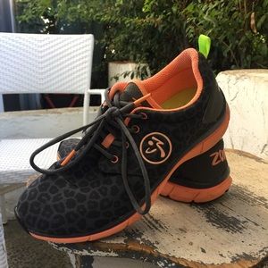 Authentic Zumba Z-slide fly print tennis shoes.