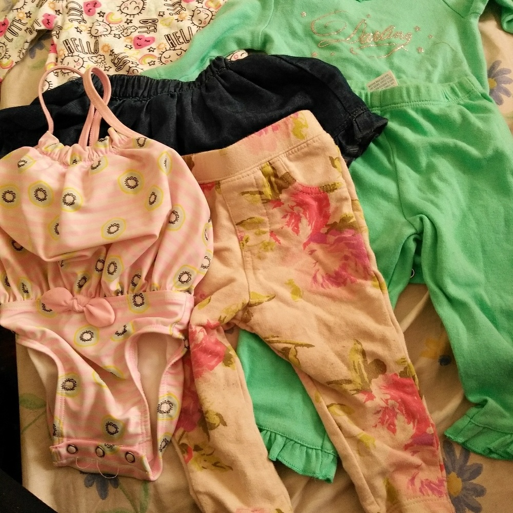 Baby clothes and a bathing suit for 6-9 months