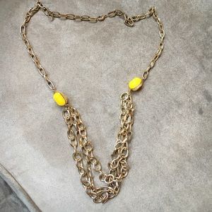 Heavy gold tone chain with yellow stones