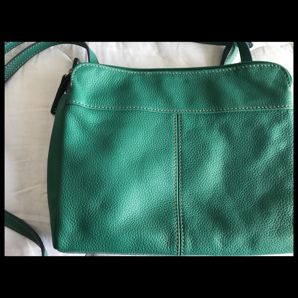 Mint green leather purse.