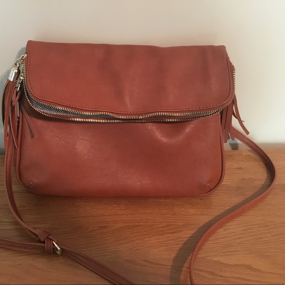 BP fold over cross body bag