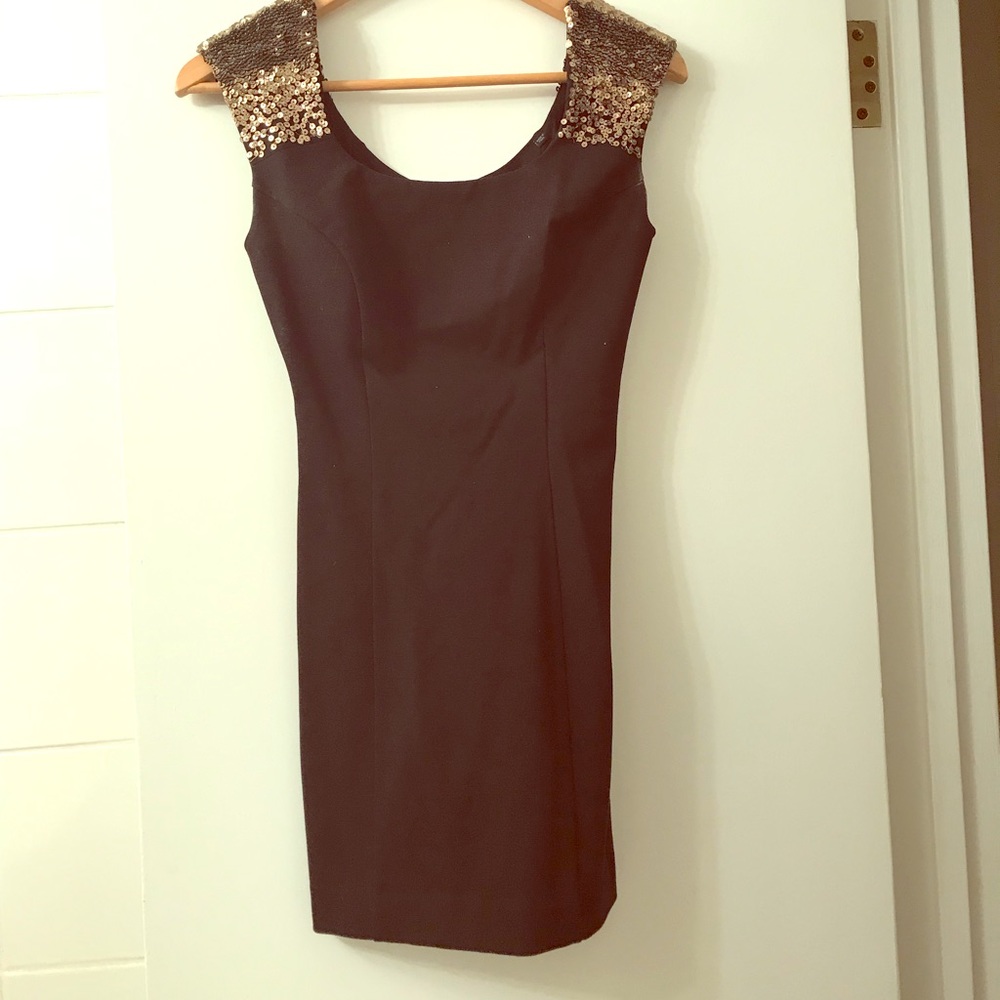 Black dress with gold sequin straps
