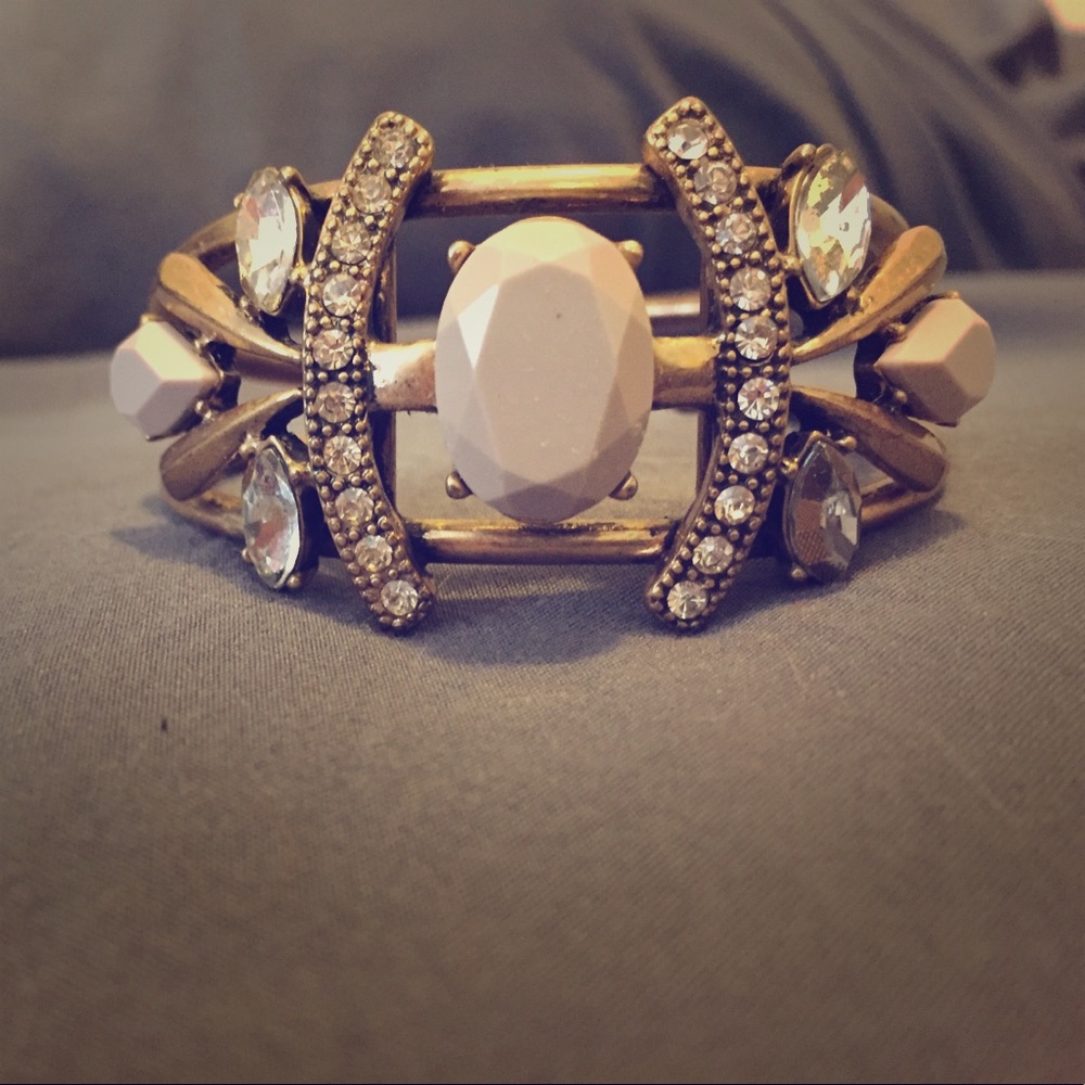 J. Crew gold, bold bracelet. Neutral color stones