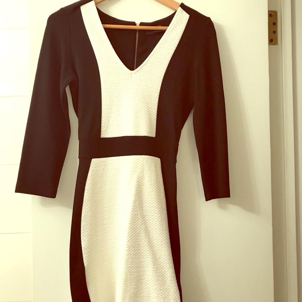 Form fitting black and white color block dress