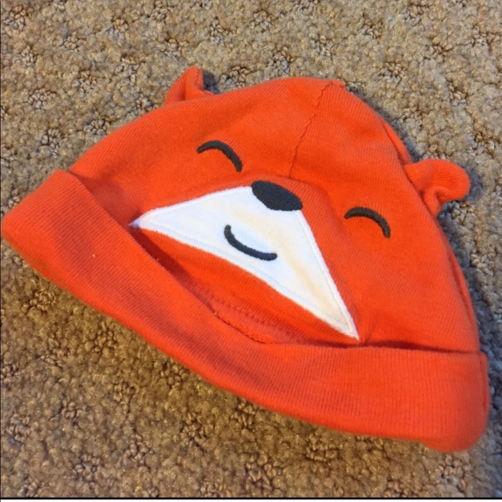 Orange fox newborn hat and footie pants.