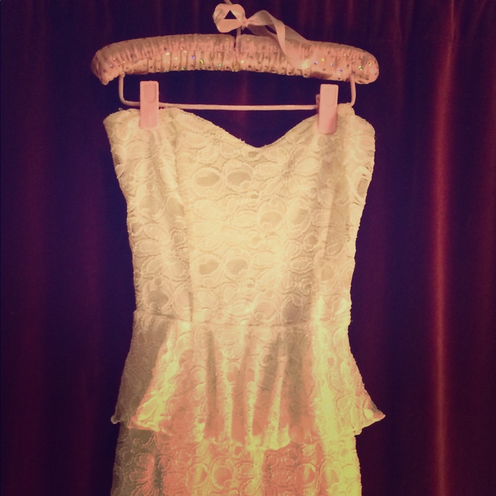 Beautiful white lace peplum dress