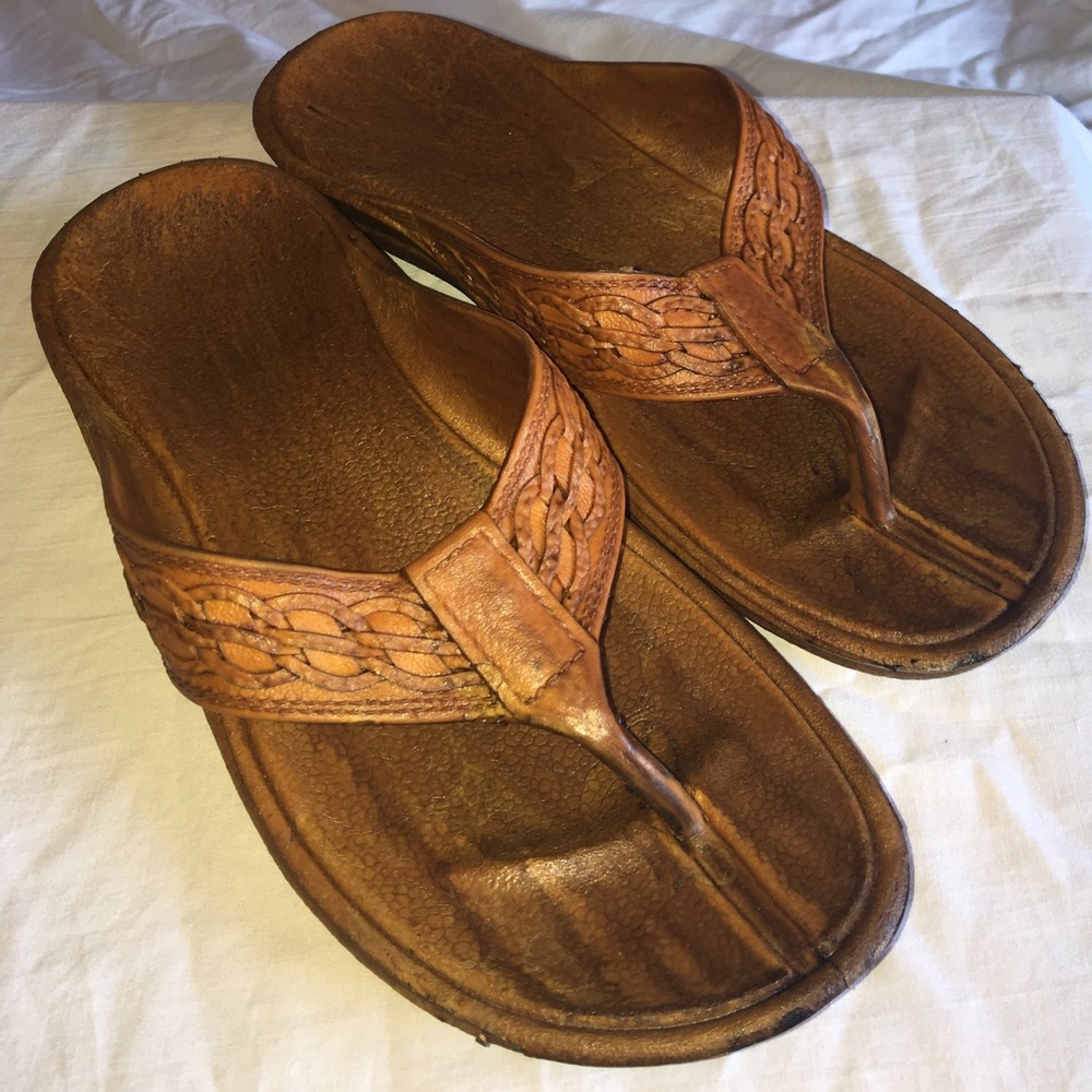 Men's brown flip flops.