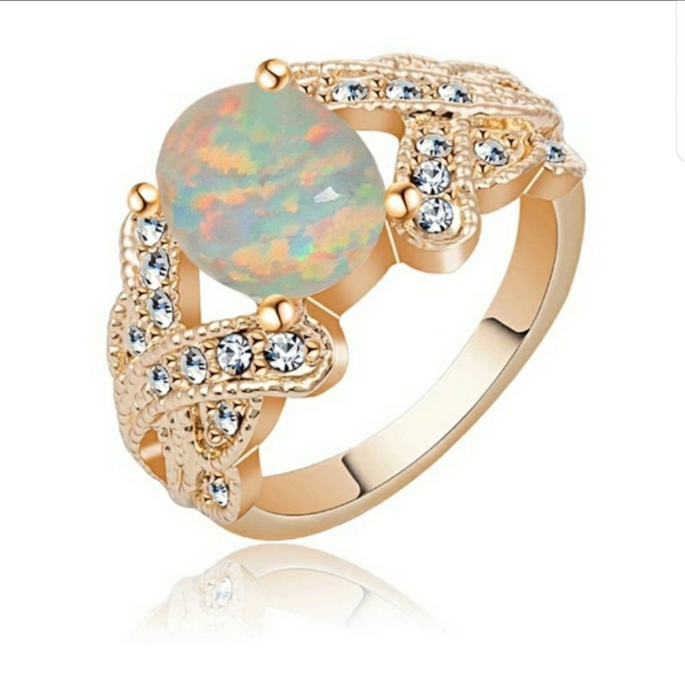 Gold Ring with Stunning White Fire Opal