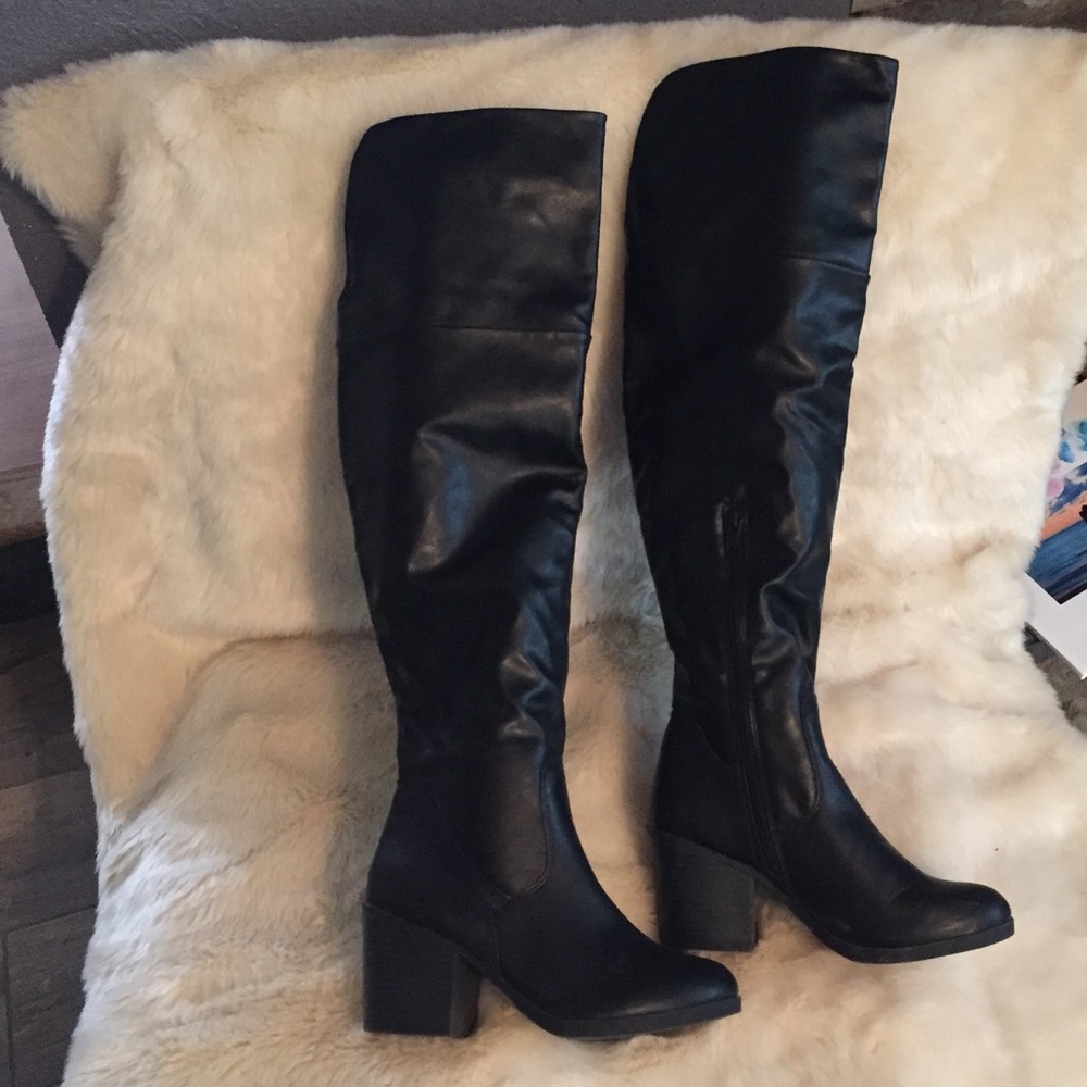 Over the knee black boots