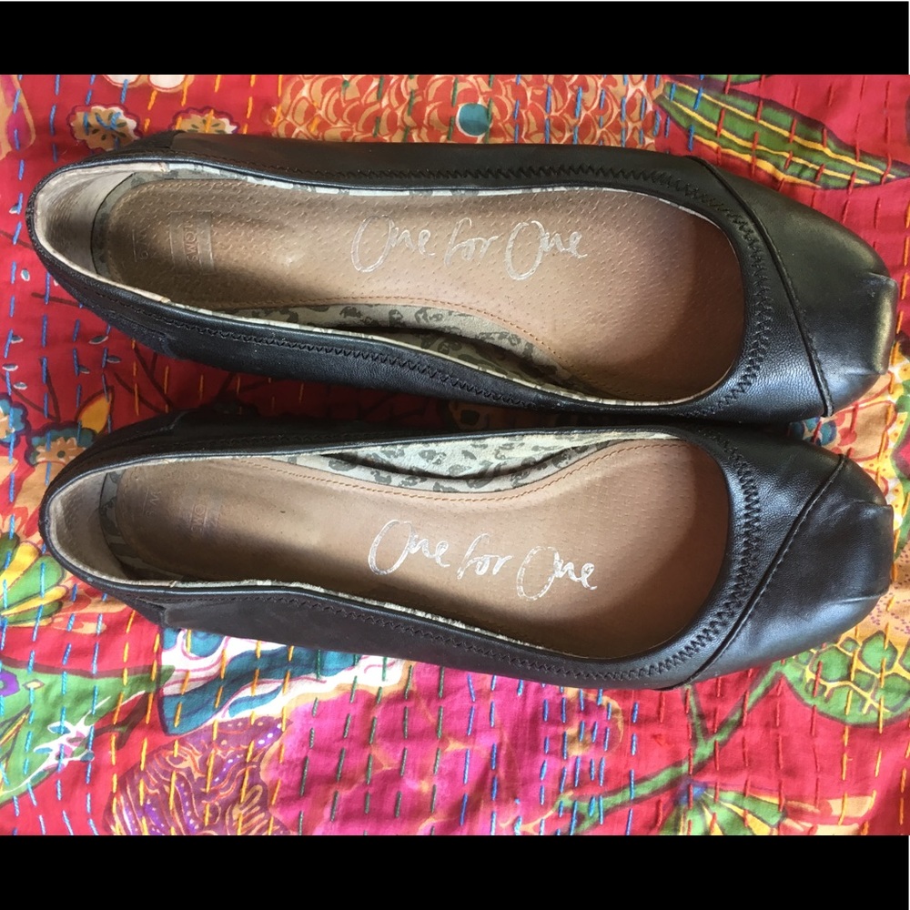 Toms black ballet flats.