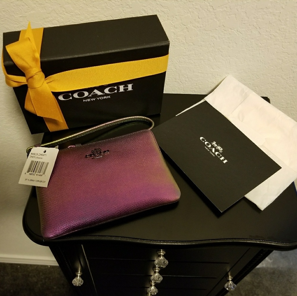 Coach Hologram wristlet.