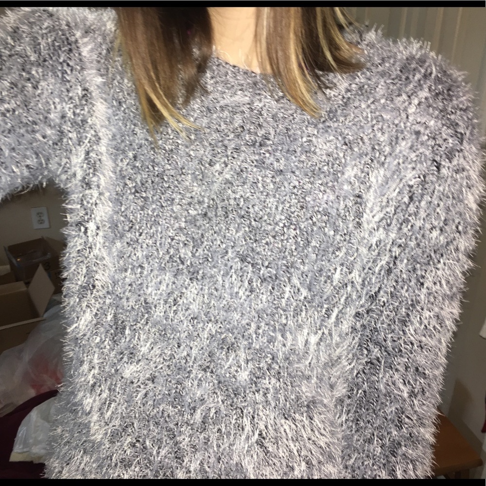 Fuzzy black and white makes grey sweater