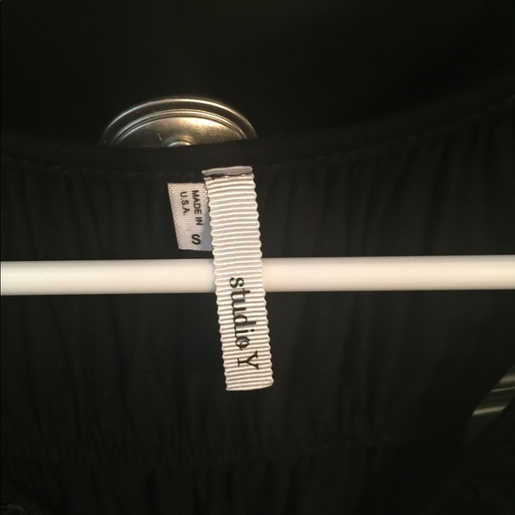 Cute black top with ruffle detail. - Picture 2 of 2