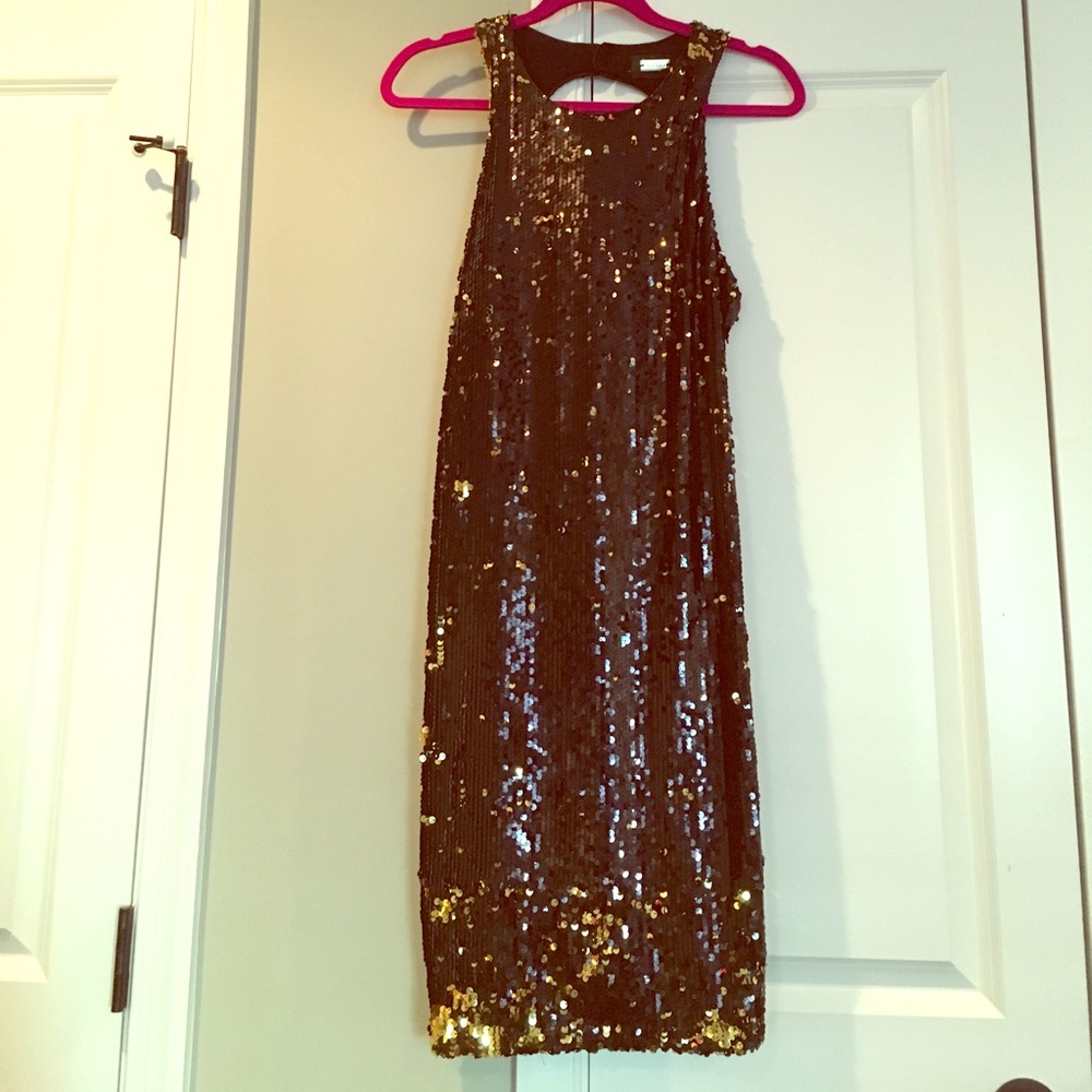 Never worn sexy sequin open back dress