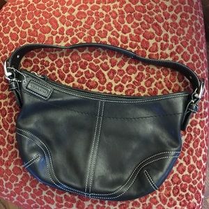 Coach small black leather handbag