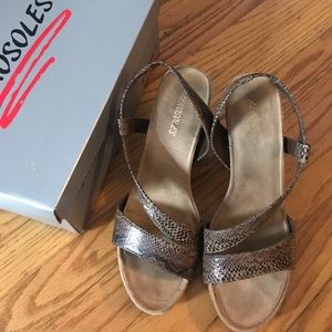 Aeorsoles snake print wedges size 8.5
