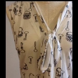 CAbi tie sleeveless tunic. Size Large