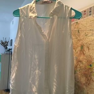 Sleeveless white button up
