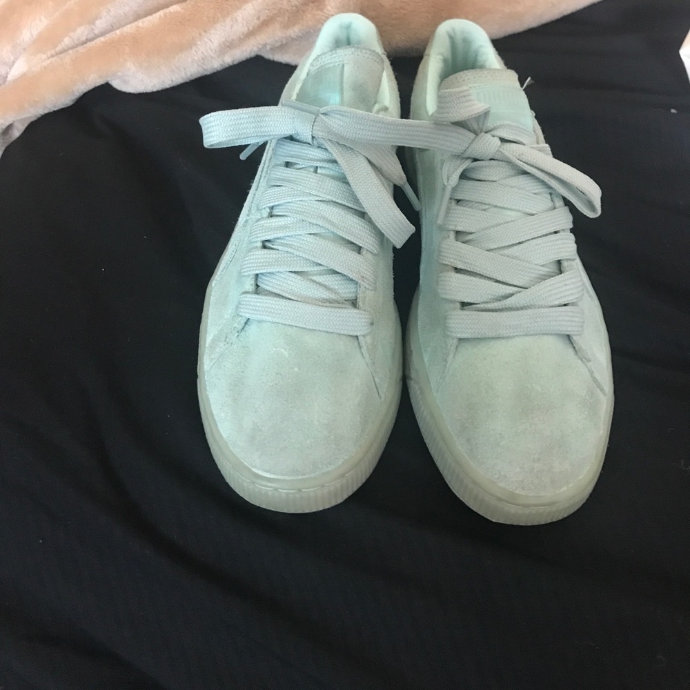 Mint green puma suede