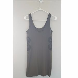 Dark green shirt dress with carvings on the sides