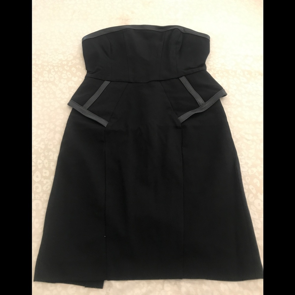 Brand new mini dress with leather inserts