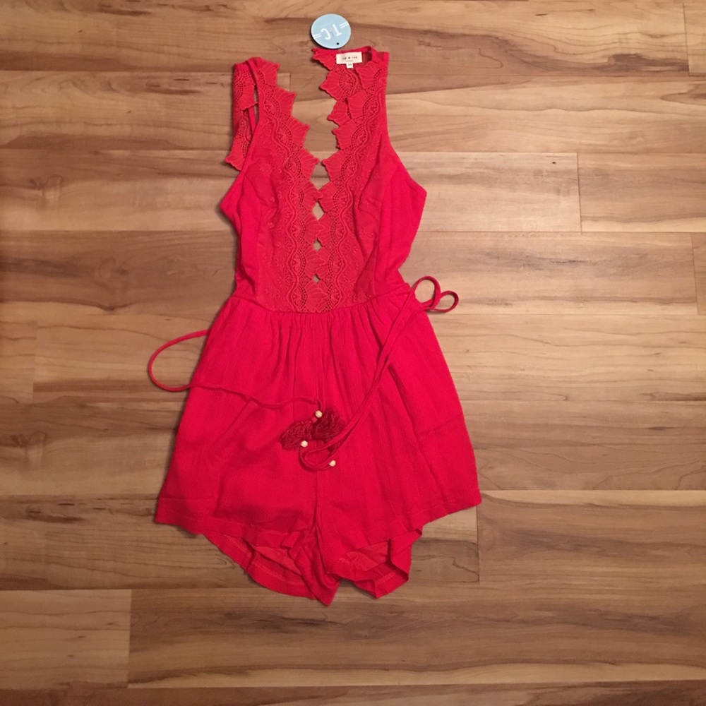 Never worn size S/M red romper from Nasty Gal