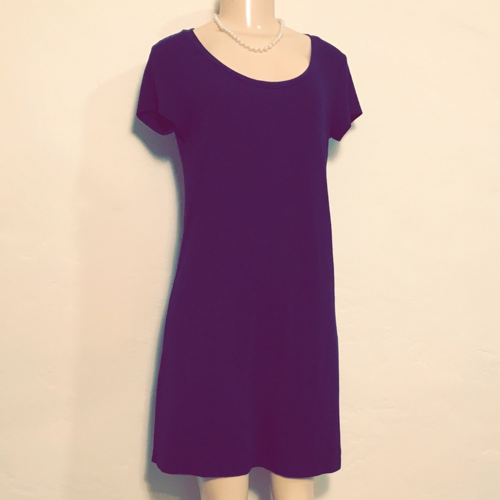 Sleek, Gorgeous, Black mini dress.