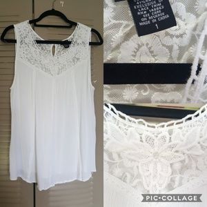White sleeveless top