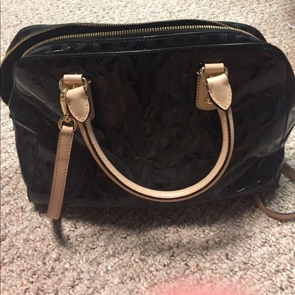 Michael Kors Handbags - Michael Kors Black Metallic MK Embossed purse 👜