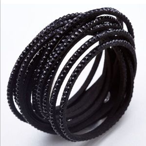 Black Swarovski bracelet.