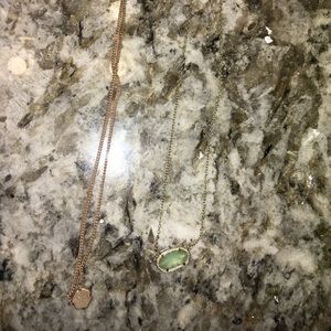 Kendra Scott necklaces.