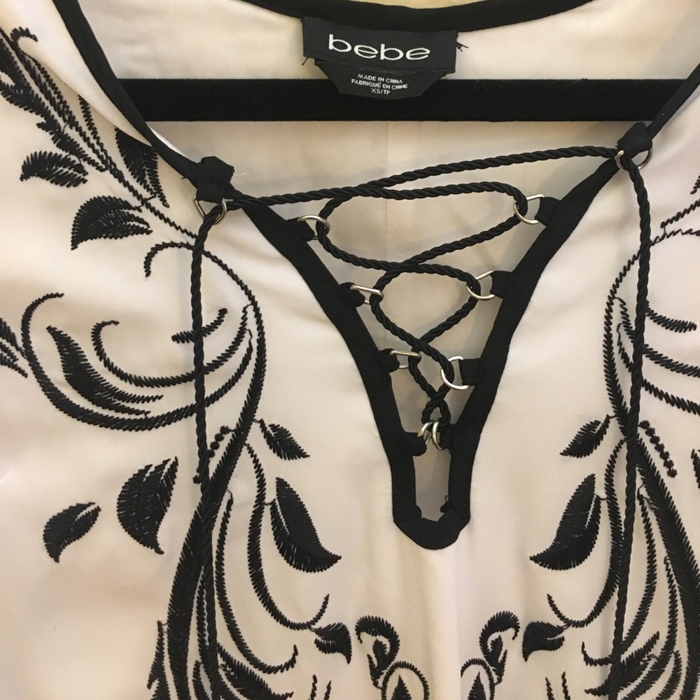 Bebe White embroidered lace up dress