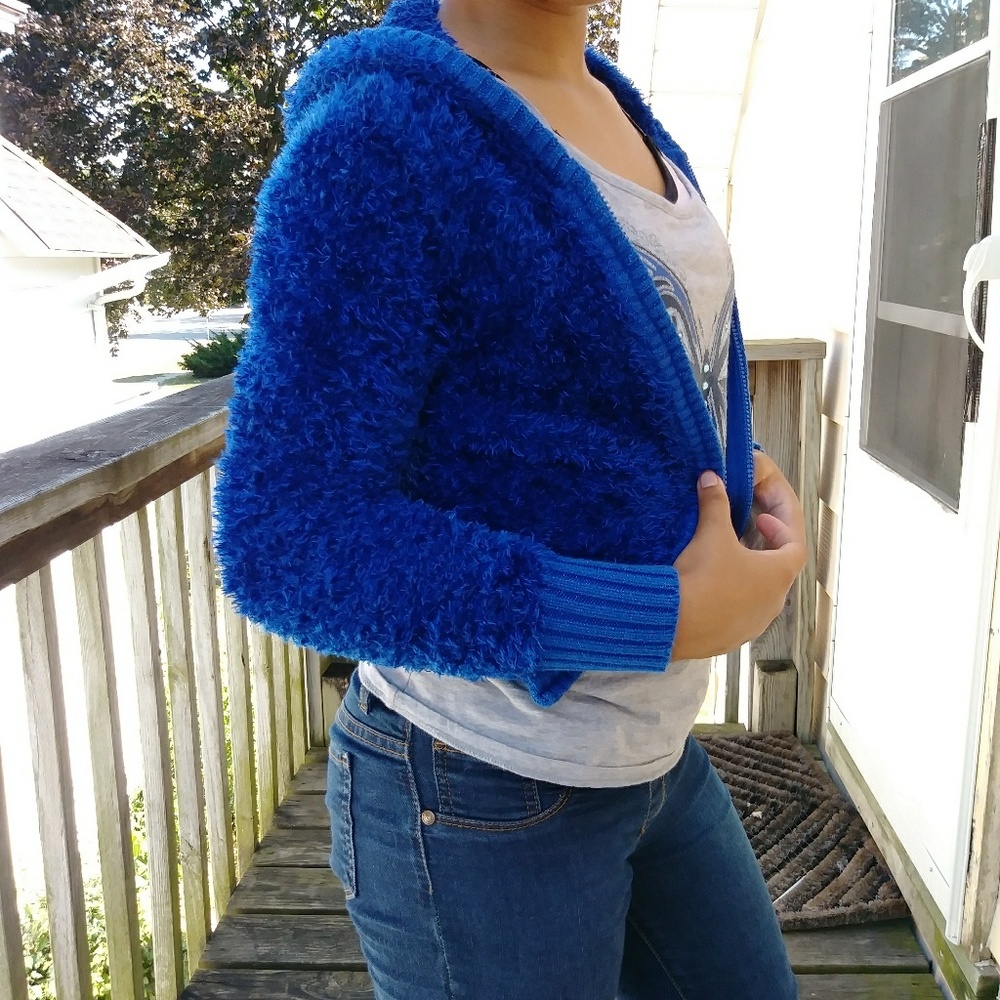 fuzzy blue Justice sweater