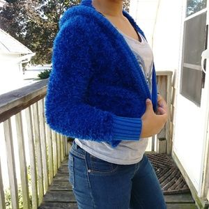 fuzzy blue Justice sweater
