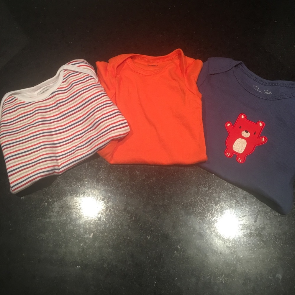 Three baby short sleeve onesies