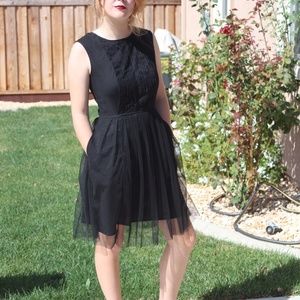 Fit and flare semi formal tuxedo pleated dress