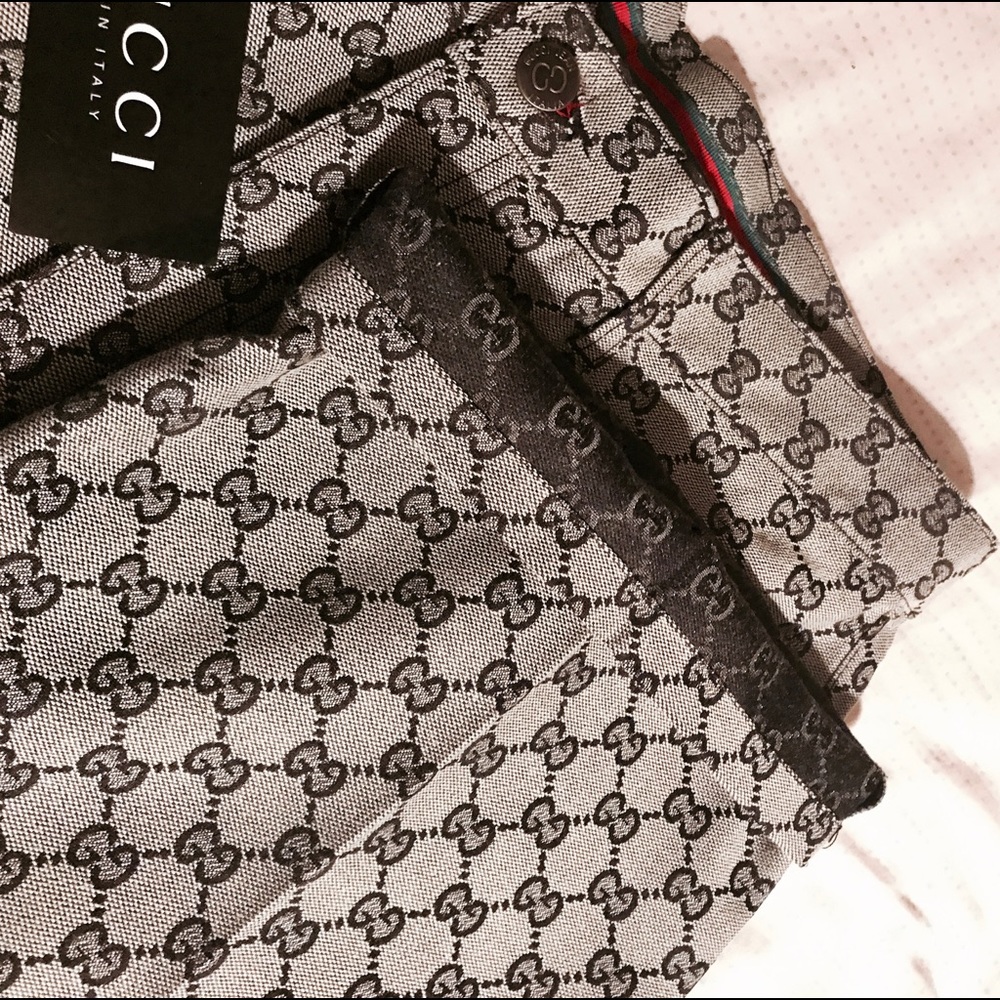 Gray and black monogrammed Gucci bottoms