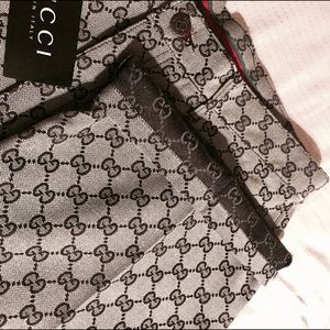 Gray and black monogrammed Gucci bottoms