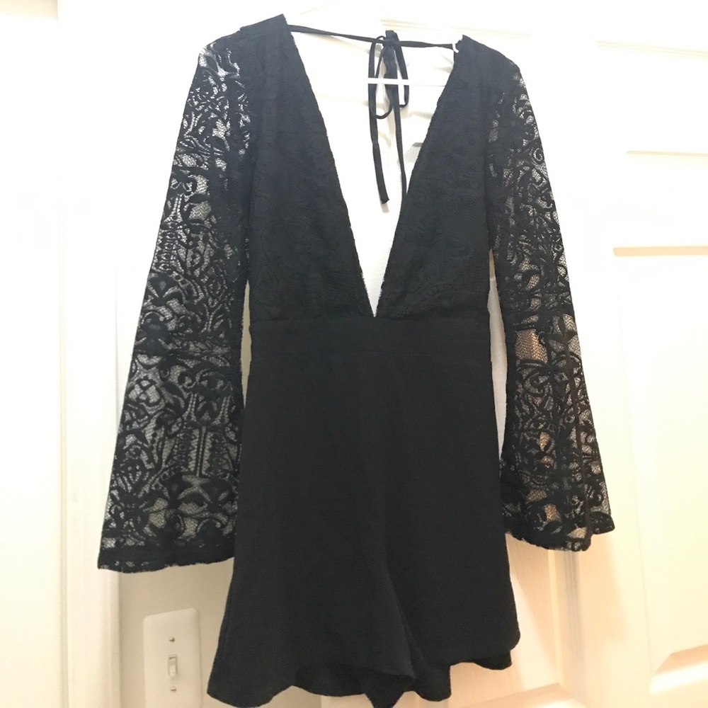 Black romper with lace sleeves