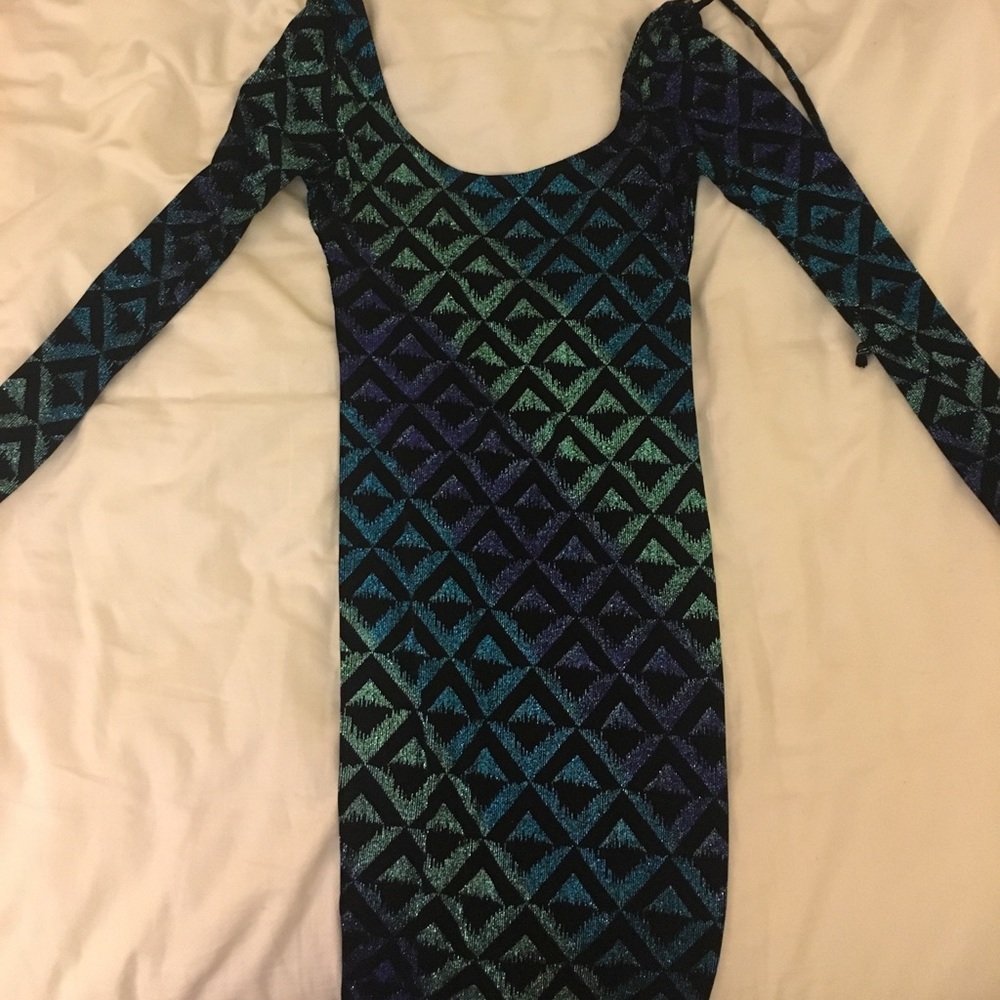 Small Long sleeve cocktail dress with an open back